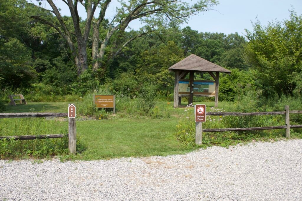 Entrance to Kitty Todd Nature Preserve featuring a native demonstration garden and interpretive signs introducing plants found throughout the preserve.